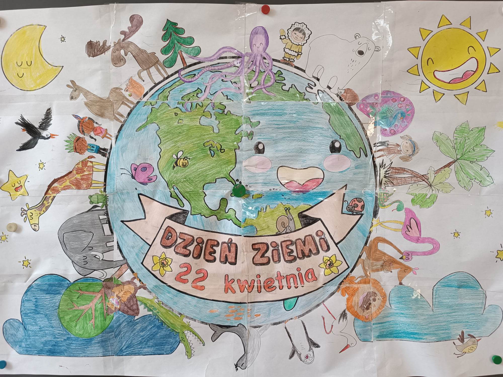 Zdjęcie plakatu z kulą ziemską na srodku