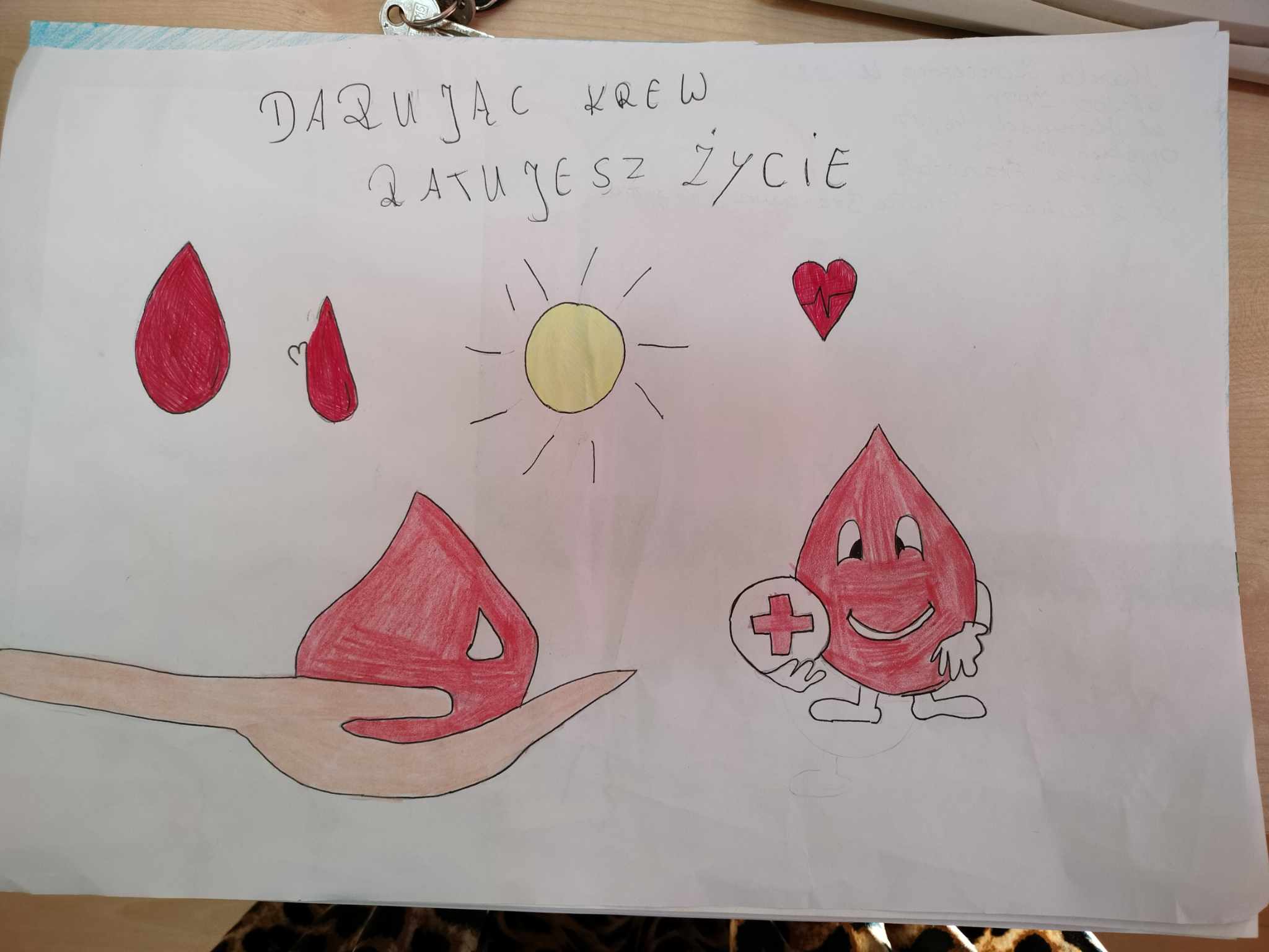 Zdjęcie przedstawia plakat
