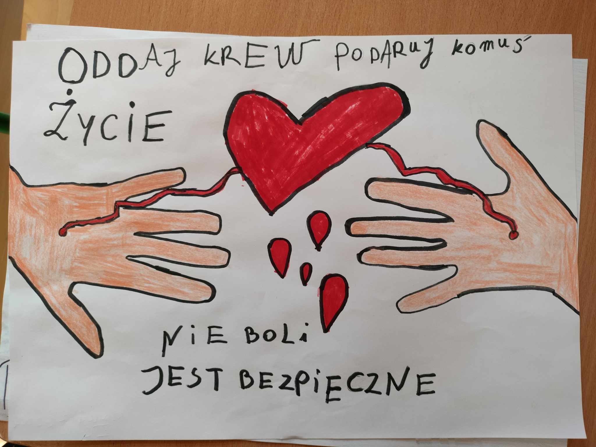 Zdjęcie przedstawia plakat